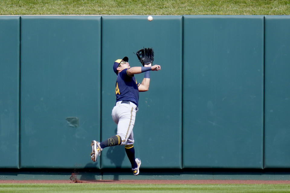 Milwaukee Brewers center fielder Avisail Garcia runs to catch a fly ball by St. Louis Cardinals' Paul DeJong during the second inning of a baseball game Sunday, Sept. 27, 2020, in St. Louis. (AP Photo/Jeff Roberson)