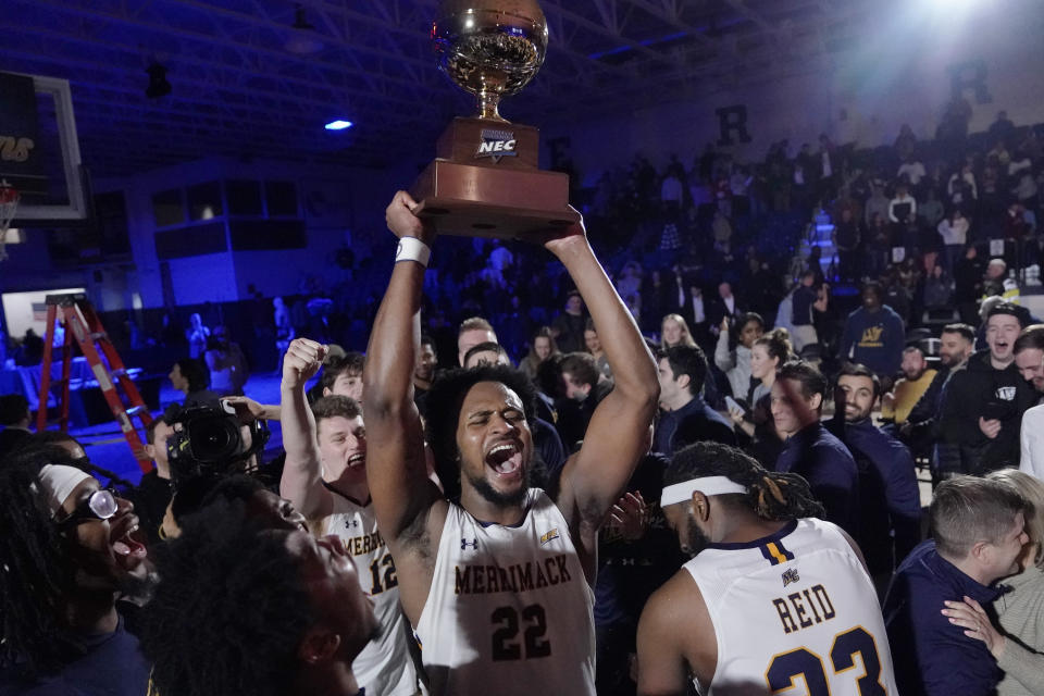 Merrimack forward Jordan Minor celebrates after winning the Northeast Conference men's NCAA college basketball championship game against Fairleigh Dickinson, Tuesday, March 7, 2023, in North Andover, Mass. (AP Photo/Charles Krupa)