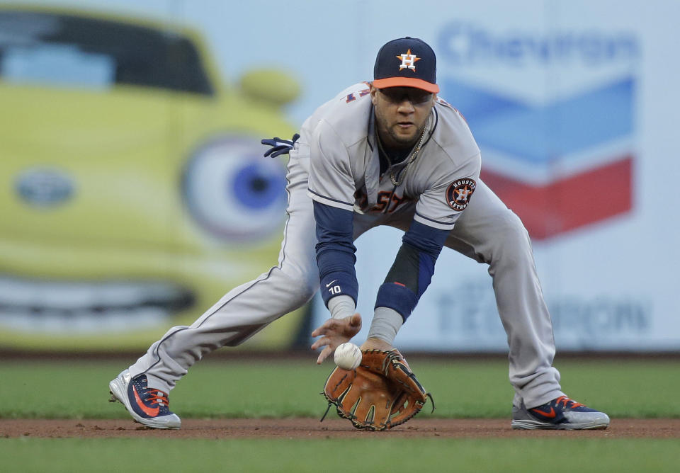 Houston Astros third baseman Yuli Gurriel fields a ground ball hit by the San Francisco Giants' Buster Posey to begin a double play in the first inning of a baseball game Monday, Aug. 6, 2018, in San Francisco. (AP Photo/Eric Risberg)