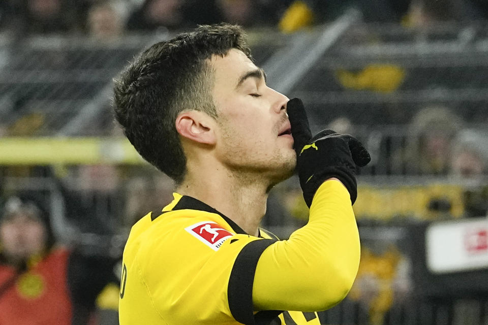 Dortmund's Giovanni Reyna celebrates scoring his side's fourth goal during the German Bundesliga soccer match between Borussia Dortmund and FC Augsburg in Dortmund, Germany, Sunday, Jan. 22, 2023. (AP Photo/Martin Meissner)