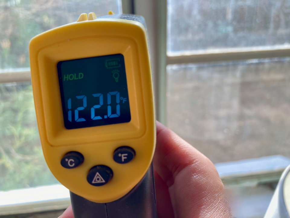 The surface temperature of single-glazed steel casement windows contributes to discomfort in older homes. This window registered 122 F (50 C) when the outdoor temperature was 108 F (42.2 C). Jonathan Bean