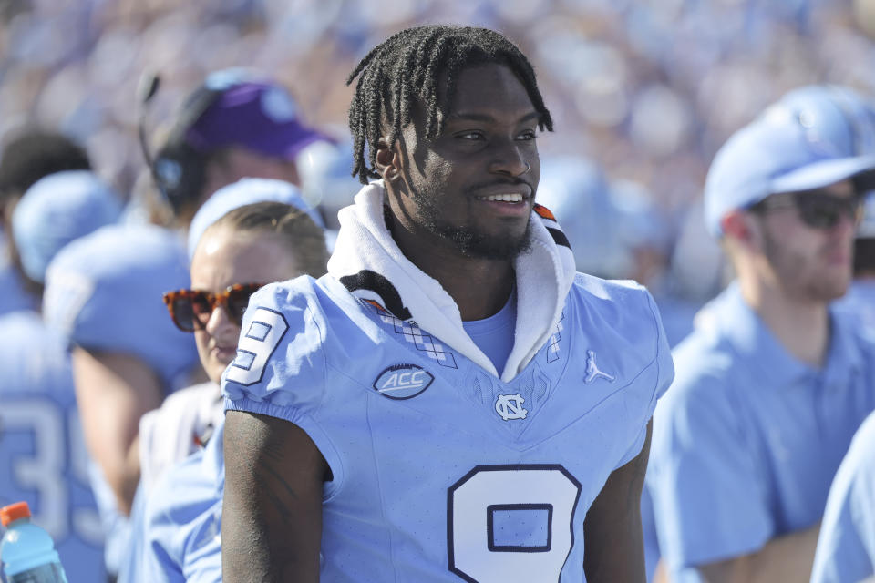 North Carolina wide receiver Devontez Walker (9) watches the game from the bench during the second quarter of an NCAA college football game against Minnesota, Saturday, Sept. 16, 2023, in Chapel Hill, N.C. (AP Photo/Reinhold Matay)