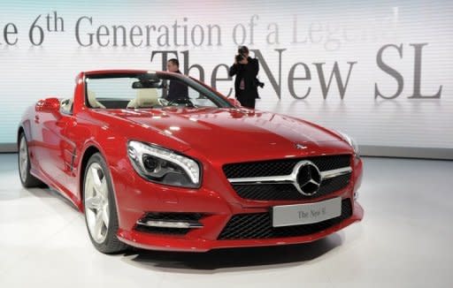 The new Mercedes-Benz SL is revealed a day before press previews at the 2012 North American International Auto Show in Detroit. Glamour and glitz returned to the Detroit auto show as once-struggling General Motors served champagne at a sneak peek of its newest Cadillac and Mercedes launched its latest roadster with a jazzy serenade at a swank cocktail party.