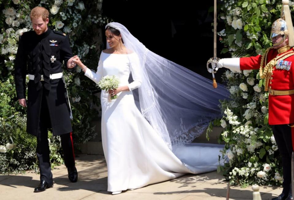 Prince Harry, Duke of Sussex and Meghan, Duchess of Sussex, leave St. George’s Chapel at Windsor Castle after their wedding ceremony on May 19, 2018, in Windsor, England. (Photo by Andrew Matthews – WPA Pool/Getty Images)