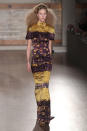 <b>LFW AW13: L'Wren Scott </b><br><br>Models walked the runway in printed maxi dresses.<br><br>© Getty