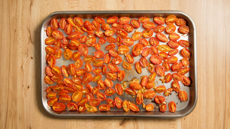 roasted tomatoes on baking sheet 