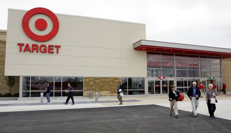 FILE PHOTO: Target Corporation shareholders leave the annual shareholders meeting following a vote to keep the current Target board members at a new Target store in Waukesha
