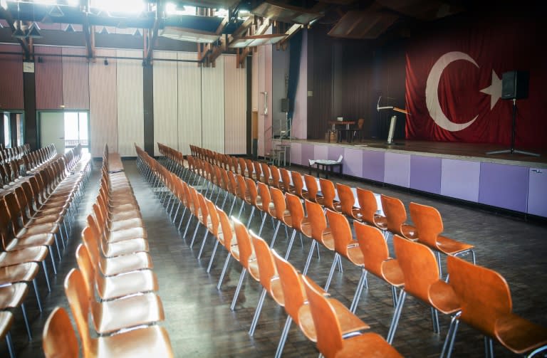 The festival hall in the German town of Gaggenau was decked with Turkish flags ahead of a planned speech by Bekir Bozdag