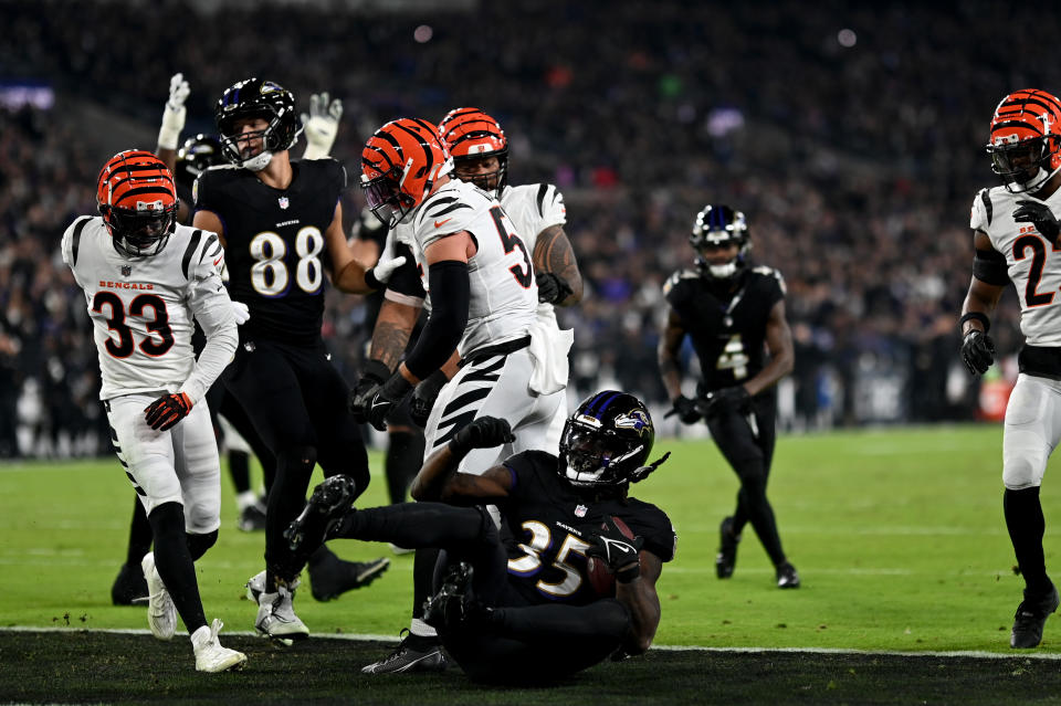 Nov 16, 2023; Baltimore, Maryland, USA; Baltimore Ravens running back Gus Edwards (35) scores a touchdown during the first quarter against the Cincinnati Bengals at M&T Bank Stadium. Mandatory Credit: Tommy Gilligan-USA TODAY Sports