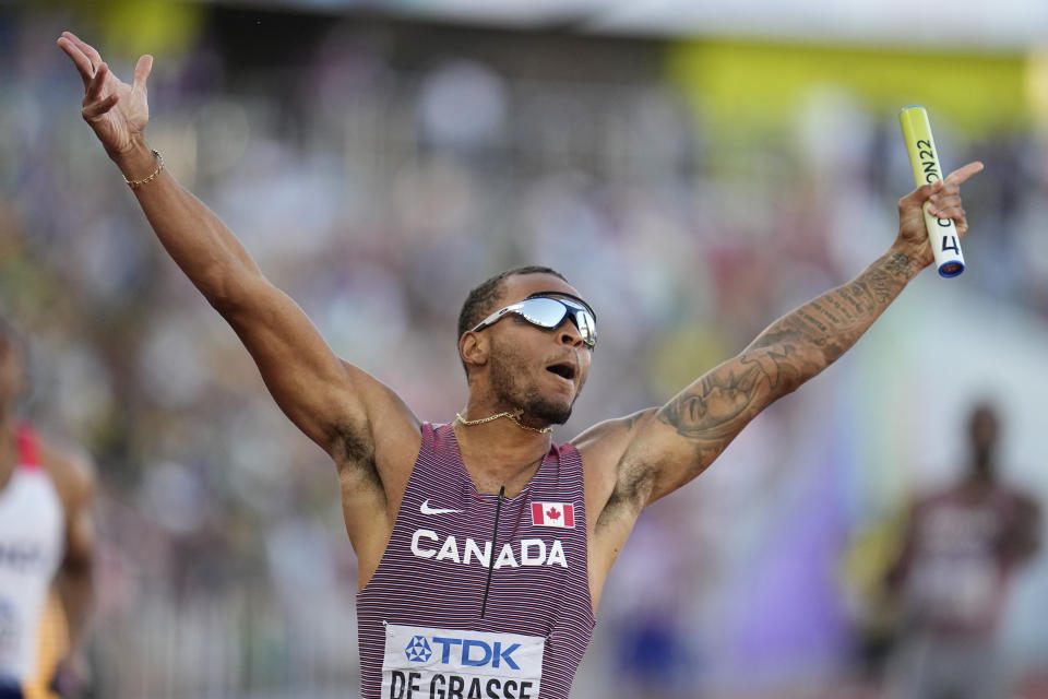 Andre De Grasse, of Canada, wins the final in the men's 4x100-meter relay at the World Athletics Championships on Saturday, July 23, 2022, in Eugene, Ore. (AP Photo/Ashley Landis)