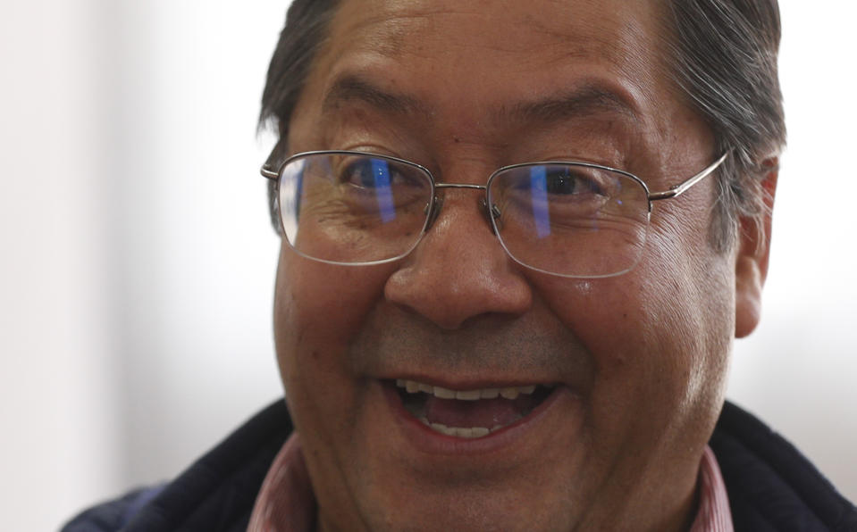 Luis Arce, presidential candidate for the Movement Towards Socialism (MAS) party, speaks during an interview at his campaign headquarters in La Paz, Bolivia, Tuesday, Oct. 20, 2020, two days after elections. Officials have not released a formal quick count of results from Sunday’s vote, but the MAS party claimed victory in the presidential election as rival candidates conceded defeat. (AP Photo/Juan Karita)