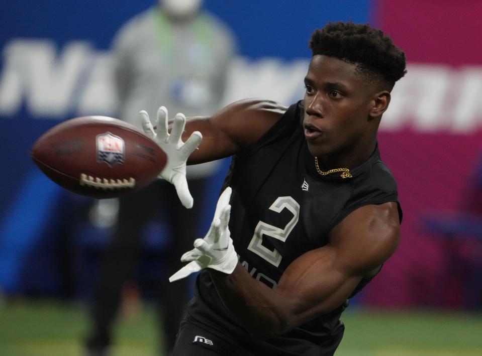 Mar 3, 2022; Indianapolis, IN, USA; Notre Dame wide receiver Kevin Austin Jr (WO02) goes through drills during the 2022 NFL Scouting Combine at Lucas Oil Stadium. Mandatory Credit: Kirby Lee-USA TODAY Sports