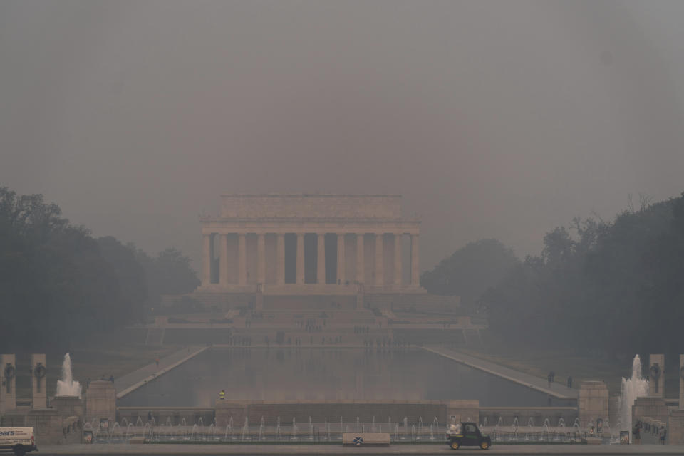 <p>The Lincoln Memorial is seen at the national mall with a thick layer of smoke covering, on Thursday, June 8, 2023, in Washington. Intense Canadian wildfires are blanketing the northeastern U.S. in a dystopian haze, turning the air acrid, the sky yellowish gray and prompting warnings for vulnerable populations to stay inside. (AP Photo/Jose Luis Magana)</p> 