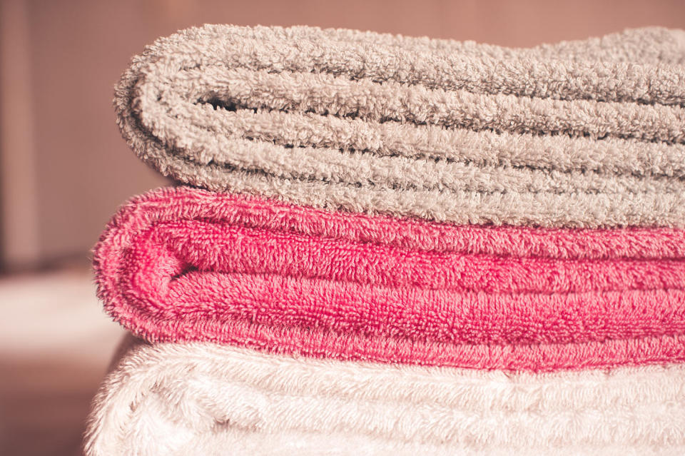 Folded towels closeup (Getty Images)
