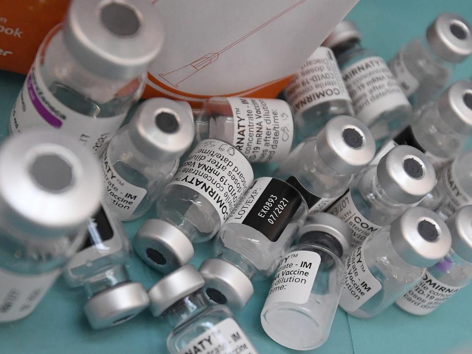 <p>Empty vials of a Covid vaccine</p> (EPA)