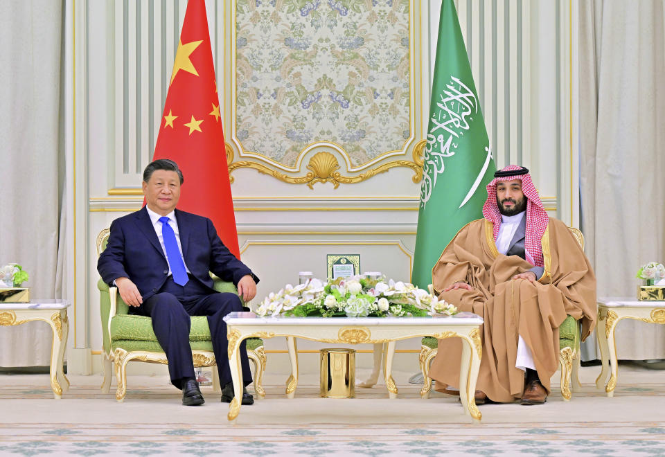 FILE - In this photo released by Xinhua News Agency, Chinese President Xi Jinping meets with Saudi Crown Prince Mohammed bin Salman at the royal palace in Riyadh, Saudi Arabia, Thursday Dec. 8, 2022. In the years since Saudi Crown Prince Mohammed bin Salman catapulted to power, it has been hard to find a controversy in the Middle East that doesn't somehow involve the 37-year-old heir to the throne. Now he's pivoting to his next audacious plan: Giving peace a chance. (Yue Yuewei/Xinhua via AP)