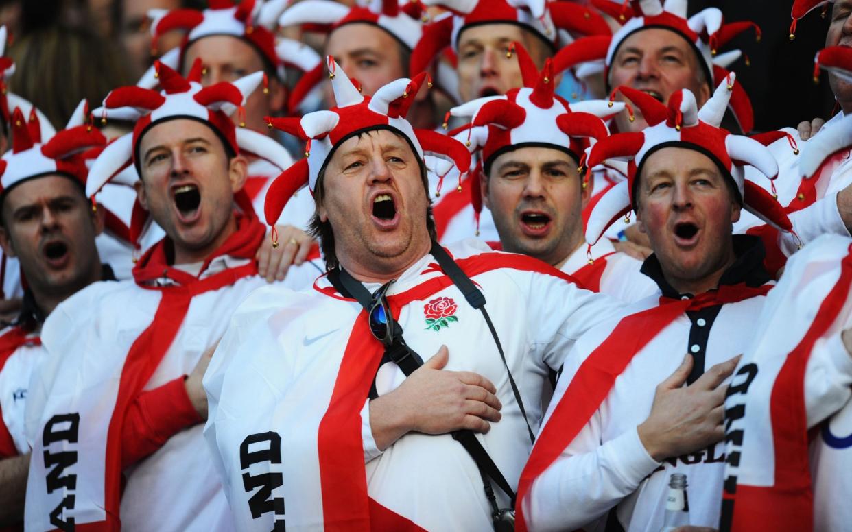 England fans cheer on their team during the RBS 6 Nations Championship - GETTY IMAGES