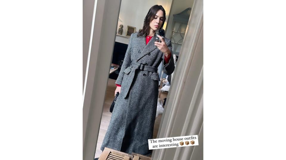 Alexa Chung taking a mirror selfie 