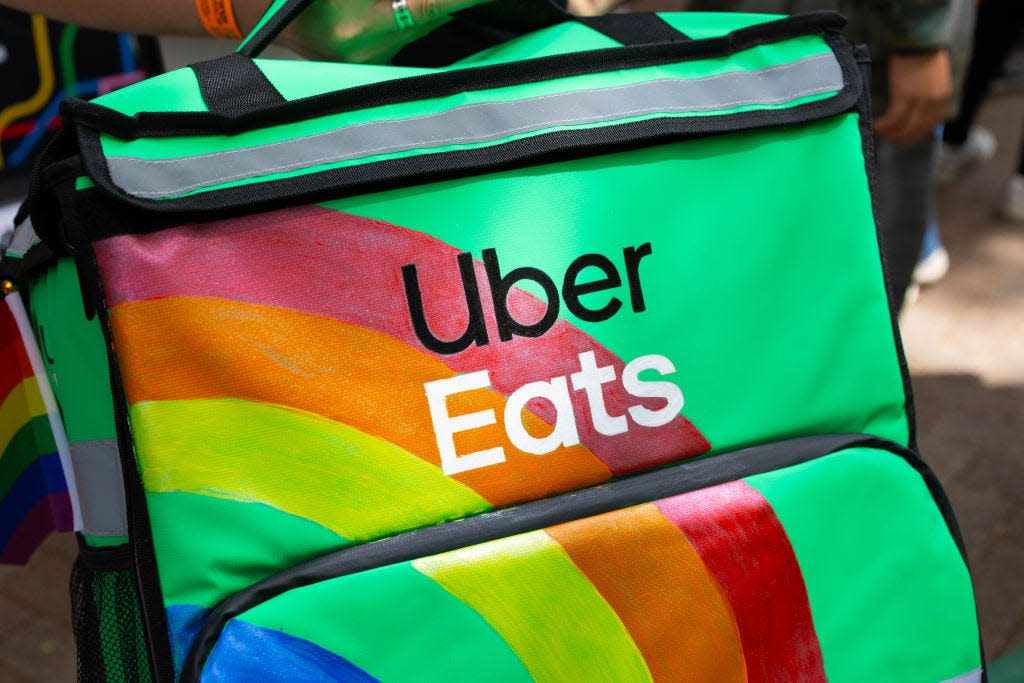 An image shows an Uber Eats delivery bag.