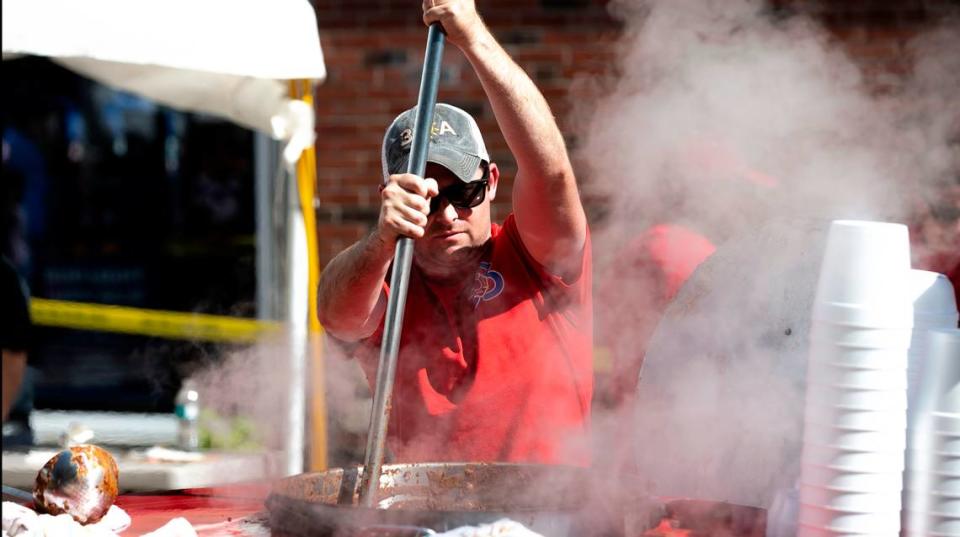 Belleville firefighter Nick Lombardo stirs chili for the Belleville Firefighters Local 53 union chili booth last year during the 37th annual Belleville Chili Cook-Off in downtown Belleville. This year’s event takes place 11 a.m. to 10:30 p.m. Friday, Oct. 7, and Saturday, Oct. 8. Derik Holtmann/dholtmann@bnd.com