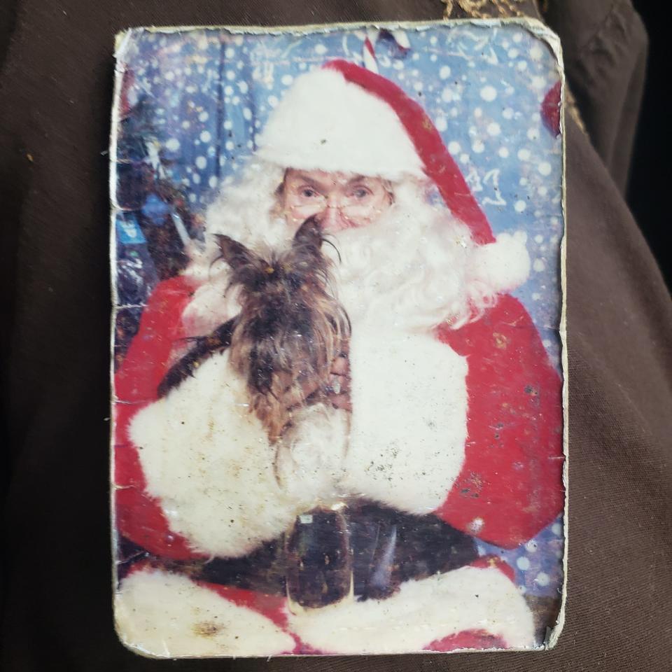 This photo of Santa Claus with a Yorkie was found in the wallet of Jack Leroy Scott who died in October 2011. Scott was unclaimed in the Bucks County coroner's office until July 25, 2023.