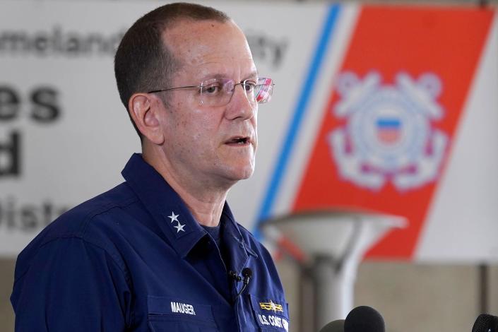 U.S. Coast Guard Rear Adm. John Mauger, commander of the First Coast Guard District, talks to the media, Monday, June 19, 2023, in Boston. A search is underway for a missing submersible that carries people to view the wreckage of the Titanic. Canadian officials say the five-person submersible was reported overdue Sunday night about 435 miles (700 kilometers) south of St. John's, Newfoundland and that the search is being led by the U.S. Coast Guard. (AP Photo/Steven Senne)