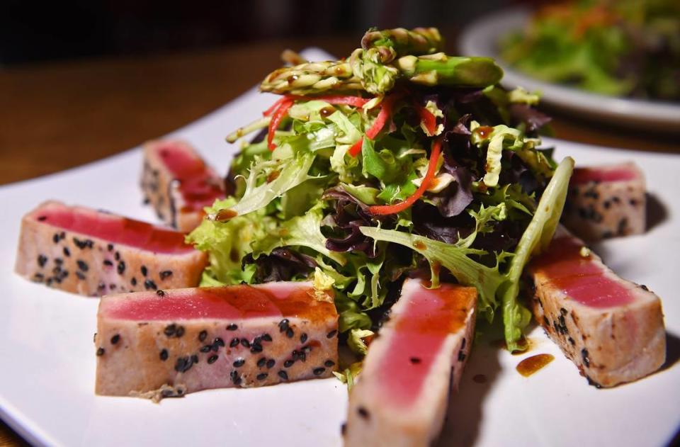 Crusted seared ahi salad in this file photo from 2019 is one of the most popular dishes served at The Craft House. ERIC PAUL ZAMORA/ezamora@fresnobee.com