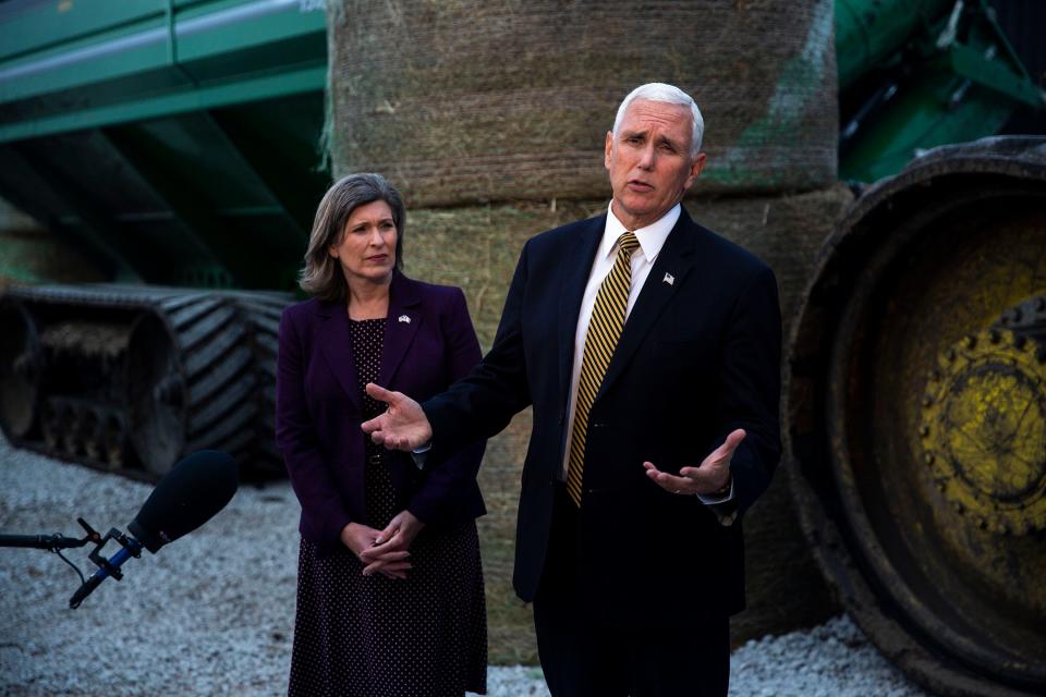 Vice President Mike Pence and U.S. Sen. Joni Ernst, R-Red Oak, answers questions from the press after speaking at an America First Policies event on Wednesday, Oct. 9, 2019, at Manning Farms in Waukee.