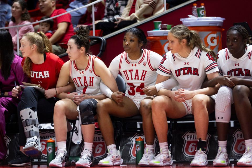 The Utah Utes sit arm in arm before guard Inês Vieira (2) ties the game with a layup against the UCLA Bruins at the Huntsman Center in Salt Lake City on Jan. 22, 2024. The Utes won 94-81 during overtime. | Marielle Scott, Deseret News