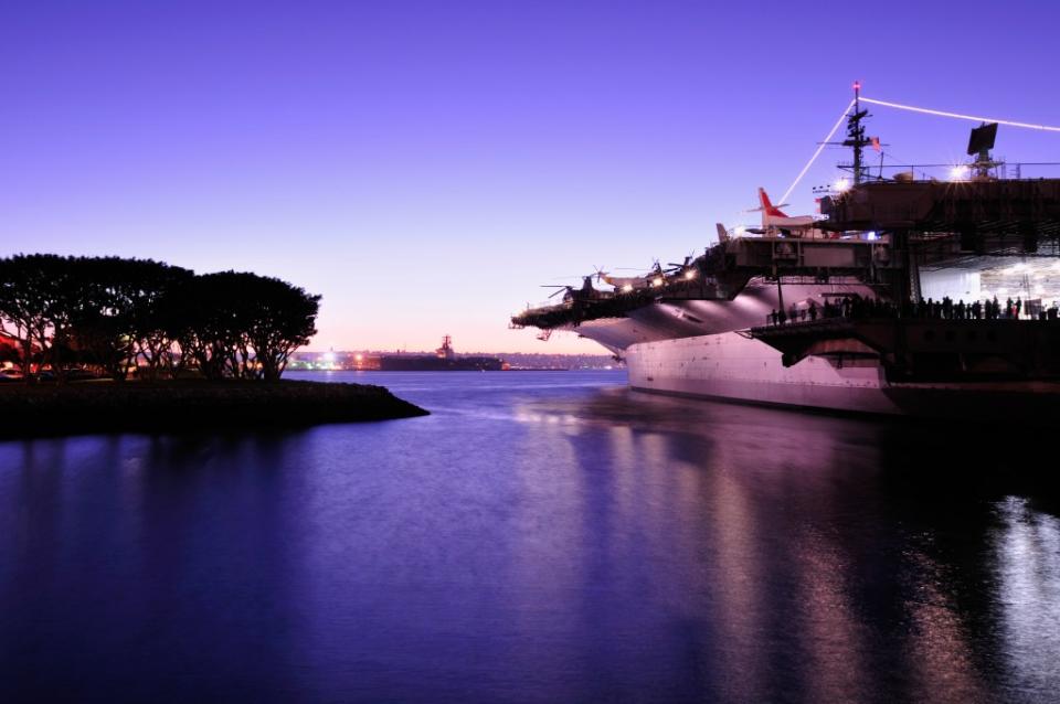 The USS Midway at Dusk in San Diego,CA via Getty Images