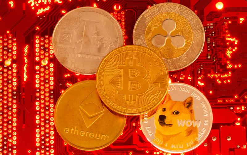 FILE PHOTO: Representations of cryptocurrencies Bitcoin, Ethereum, DogeCoin, Ripple, Litecoin are seen in this illustration