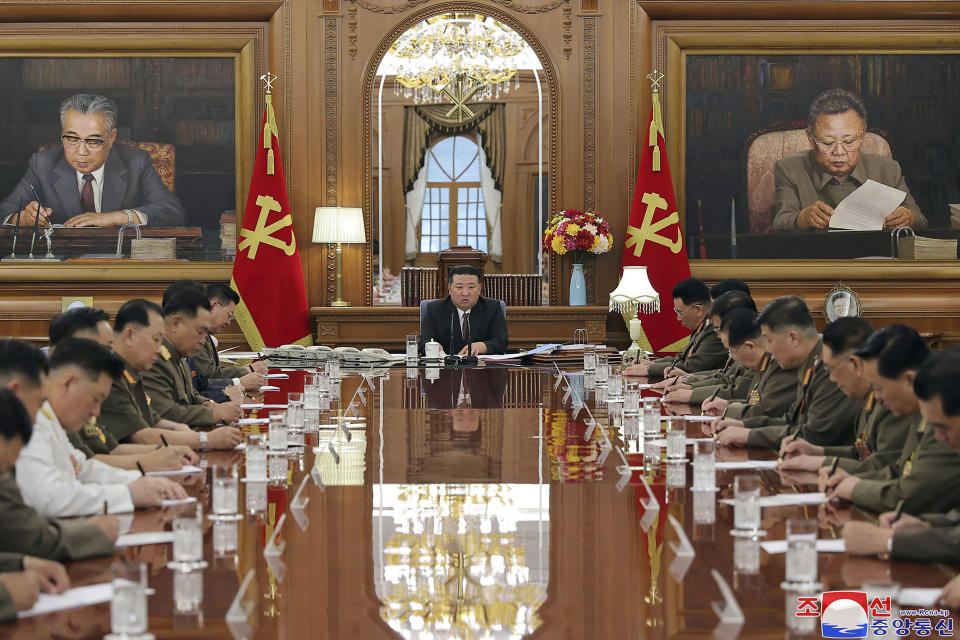 In this undated photo provided by the North Korean government, North Korean leader Kim Jong Un, center, attends a meeting of the North Korean ruling Workers’ Party’s central military commission in Pyongyang, North Korea Wednesday, Aug. 9, 2023. Independent journalists were not given access to cover the event depicted in this image distributed by the North Korean government. The content of this image is as provided and cannot be independently verified. Korean language watermark on image as provided by source reads: "KCNA" which is the abbreviation for Korean Central News Agency. (Korean Central News Agency/Korea News Service via AP)