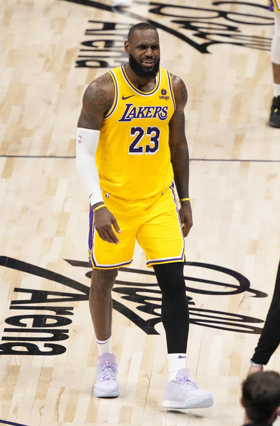 Los Angeles Lakers forward LeBron James (23) reacts as he walks back to the bench for a time out against the Denver Nuggets during the second half in Game 2 of an NBA basketball first-round playoff series Monday, April 22, 2024, in Denver. (AP Photo/Jack Dempsey)