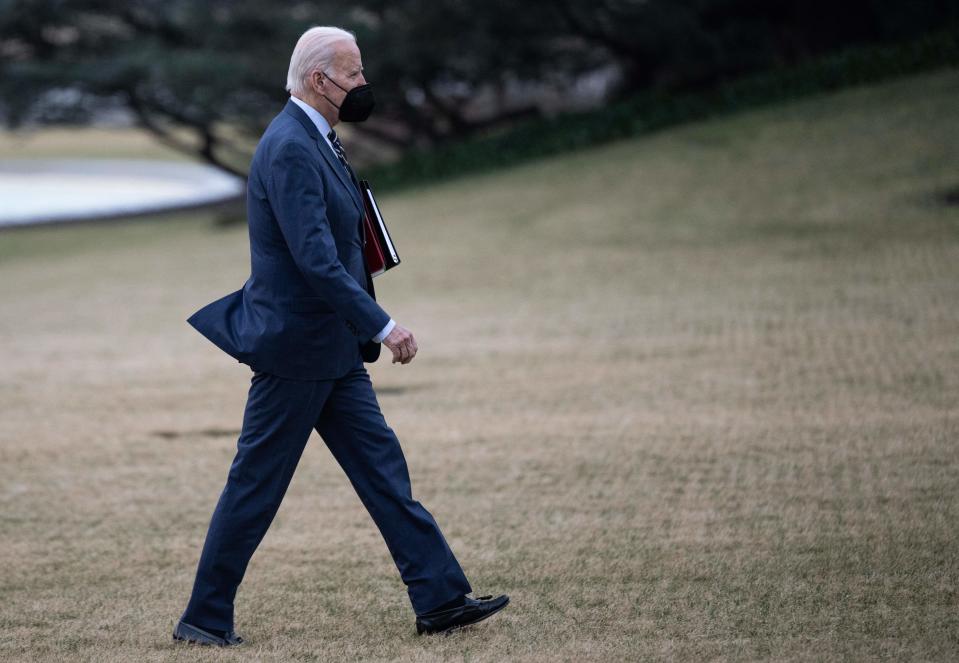 US President Joe Biden walks on the South Lawn as he returns to the White House from Walter Reed hospital in Washington, DC on January 11, 2023. (Photo by ANDREW CABALLERO-REYNOLDS / AFP) (Photo by ANDREW CABALLERO-REYNOLDS/AFP via Getty Images)