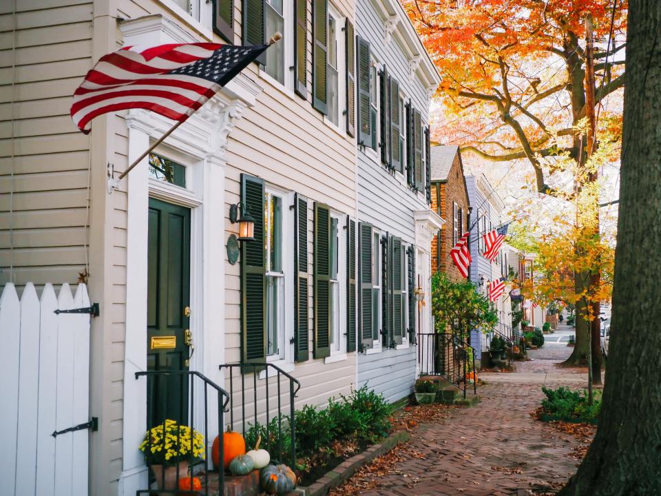 Row of houses with American flags