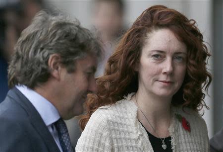 Former News International chief executive Rebekah Brooks and her husband Charlie arrive at the Old Bailey courthouse in London November 5, 2013. REUTERS/Stefan Wermuth