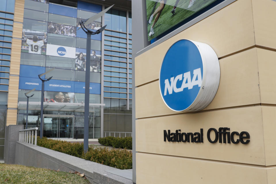 FILE - The NCAA headquarters in Indianapolis is shown in this Thursday, March 12, 2020, file photo. College athletes who were denied the chance to play immediately after transferring a second time can return to competition — for now — after a federal judge issued a 14-day temporary restraining order Wednesday, Dec. 13, 2023, against the NCAA. (AP Photo/Michael Conroy, File)
