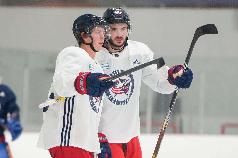 Jul. 13, 2022; Lewis Center, OH USA;  Columbus Blue Jackets forward Kent Johnson (13) talks to forward Kirill Marchenko (86) during development camp at the OhioHealth Chiller North in Lewis Center on July 13, 2022. Mandatory Credit: Adam Cairns-The Columbus Dispatch