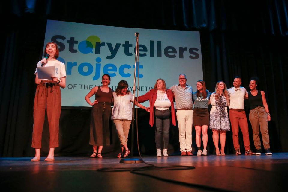 Des Moines Register reporter and Storytellers coach Sarah LeBlanc invites the storytellers and their coaches back on the stage at the conclusion of the Des Moines Register's Storytellers Project at Hoyt Sherman Place on Tuesday, June 14, 2022.