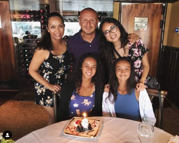 Fernandez, centre, and her family moved from Quebec to Florida to help her career.   (Leylah Fernandez/Instagram - image credit)