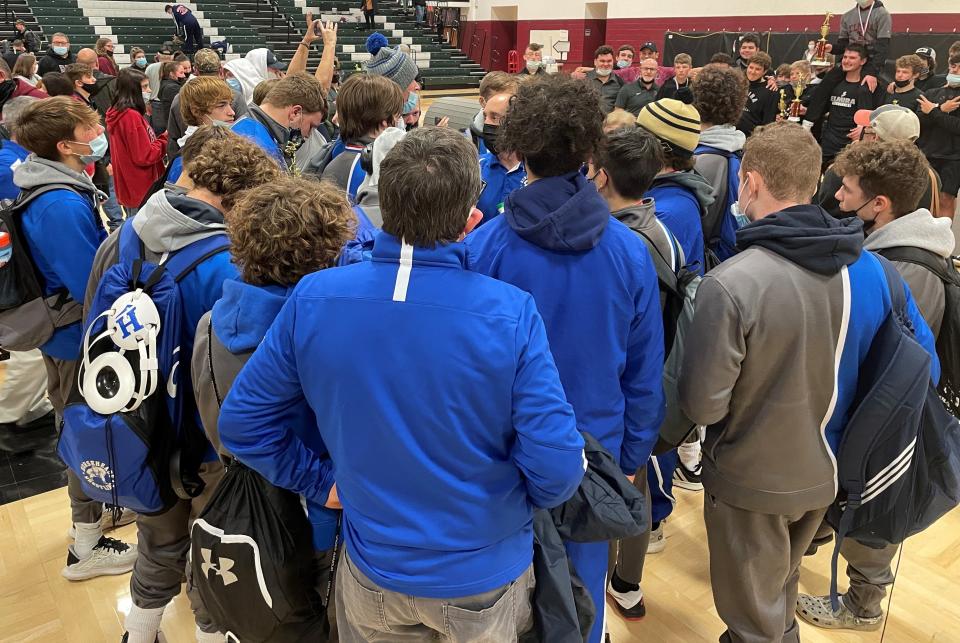 Horseheads coach Brett Owen talks to his team after it captured the championship at the Dave Buck Memorial Wrestling Tournament on Dec. 11, 2021 at Elmira High School.