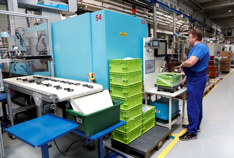 An employee works at the Simon Manufacturer of Plastic Products in Koszarhegy