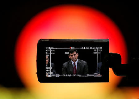 Reserve Bank of India (RBI) Governor Raghuram Rajan is seen in a TV camera's viewfinder as he attends a news conference after the bimonthly monetary policy review in Mumbai, India, June 7, 2016. REUTERS/Danish Siddiqui