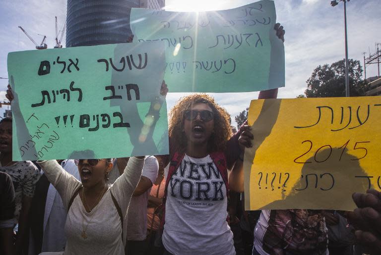 Israelis take part in a demonstration in Tel Aviv called by members of the Ethiopian community against alleged police brutality and institutionalised discrimination, on May 3, 2015