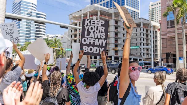 PHOTO: An abortion rights activist holds a sign at a protest in support of abortion access, on July 13, 2022 in Fort Lauderdale, Fla.   (John Parra/Getty Images for MoveOn, FILE)