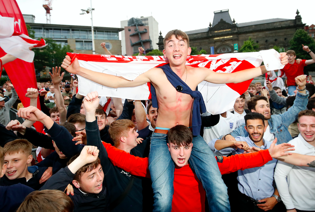 England fans in Leeds watch their team play Tunisia (Picture: PA)