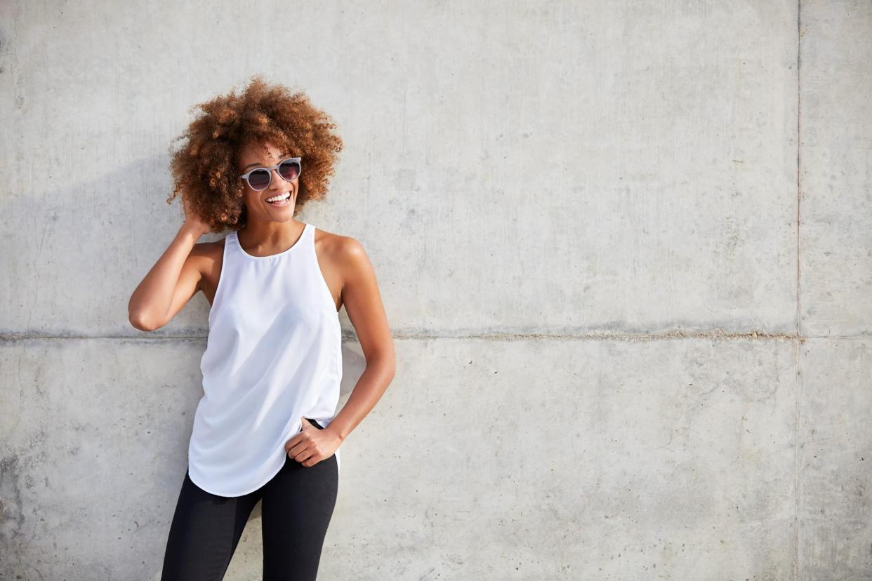 happy smiling woman in tank top