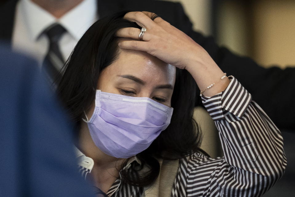 Meng Wanzhou leaves B.C. Supreme Court in Vancouver, British Columbia, Monday, Sept. 28, 2020. The senior executive for Chinese communications giant Huawei Technologies was in court arguing that her extradition to the U.S. should be halted because her rights have been violated. (Jonathan Hayward/The Canadian Press via AP)