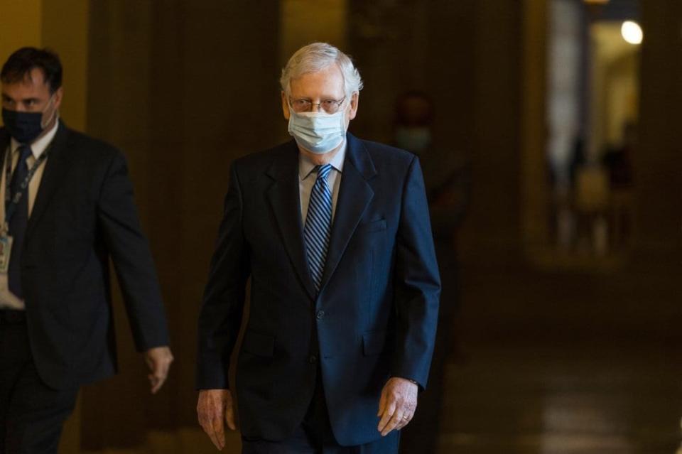 Senate Majority Leader Sen. Mitch McConnell of Ky. walks towards the Senate floor on Capitol Hill, Thursday, Oct. 1, 2020, in Washington. (AP Photo/Manuel Balce Ceneta)