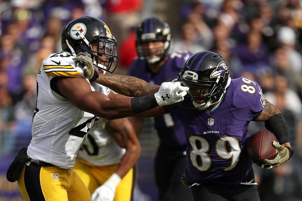 <p>Wide receiver Steve Smith #89 of the Baltimore Ravens carries the ball against free safety Mike Mitchell #23 of the Pittsburgh Steelers in the first quarter at M&T Bank Stadium on November 6, 2016 in Baltimore, Maryland. (Photo by Patrick Smith/Getty Images) </p>